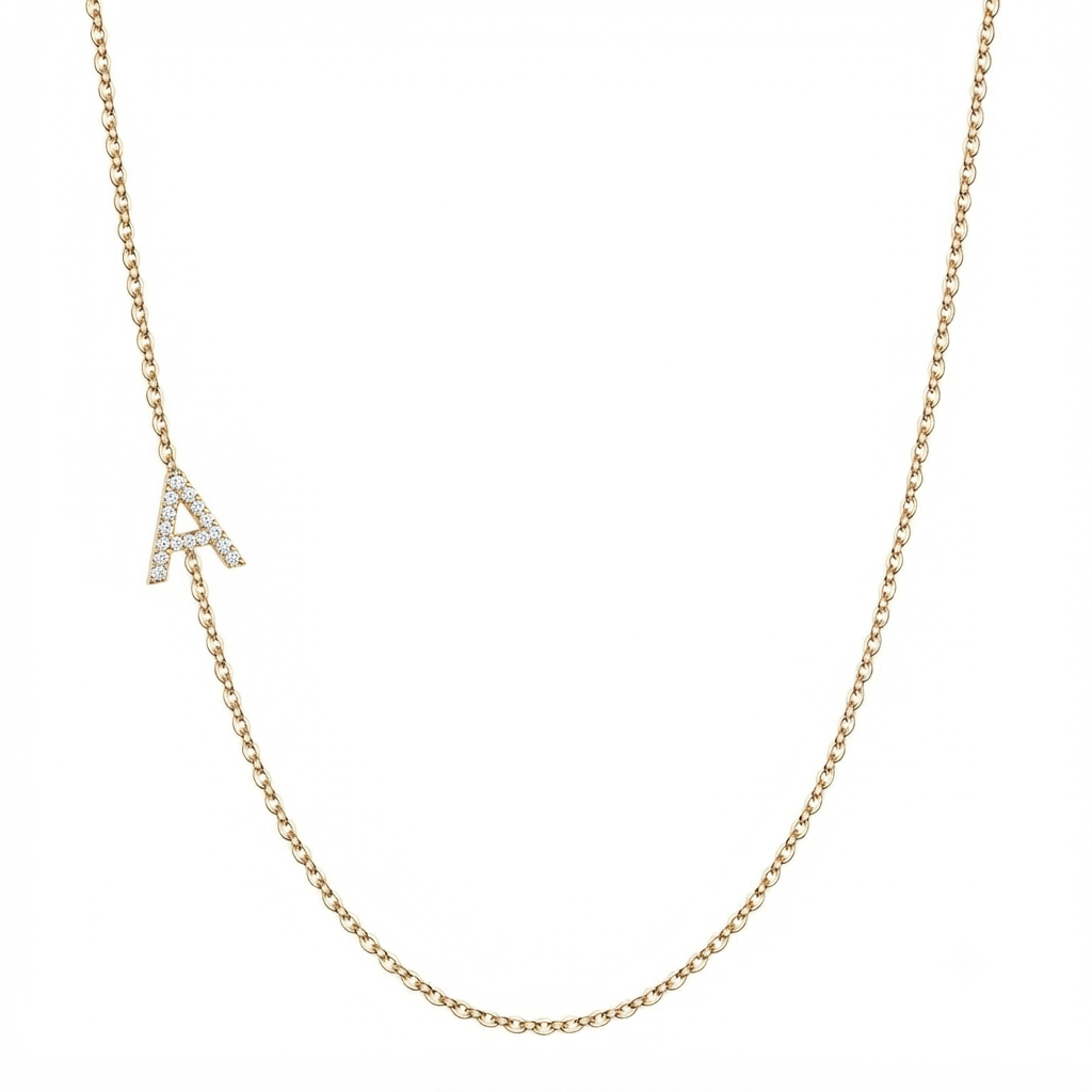 14k gold initial necklace with letter A pave diamond pendant on white background