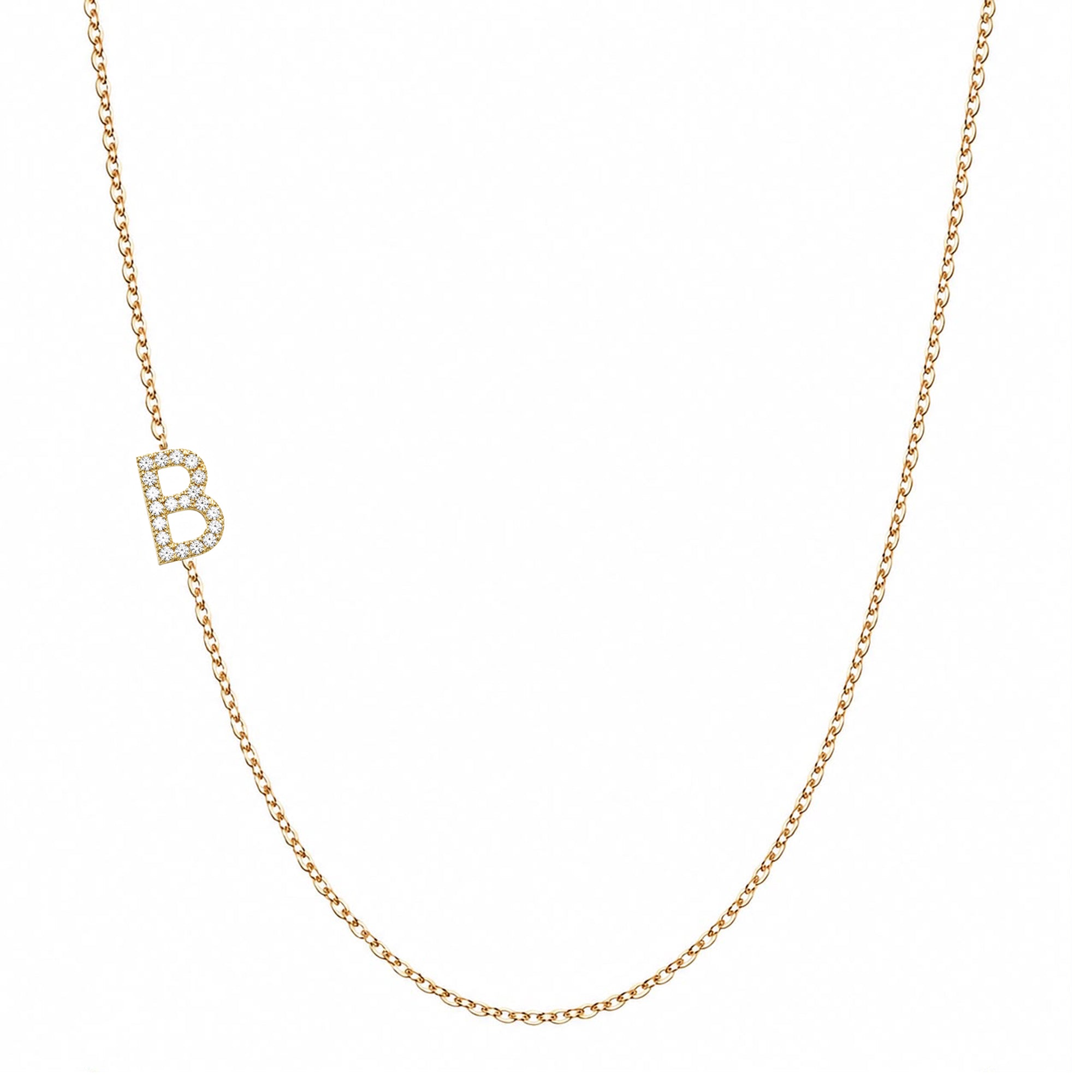 14k gold initial necklace with letter B pave diamond pendant on white background