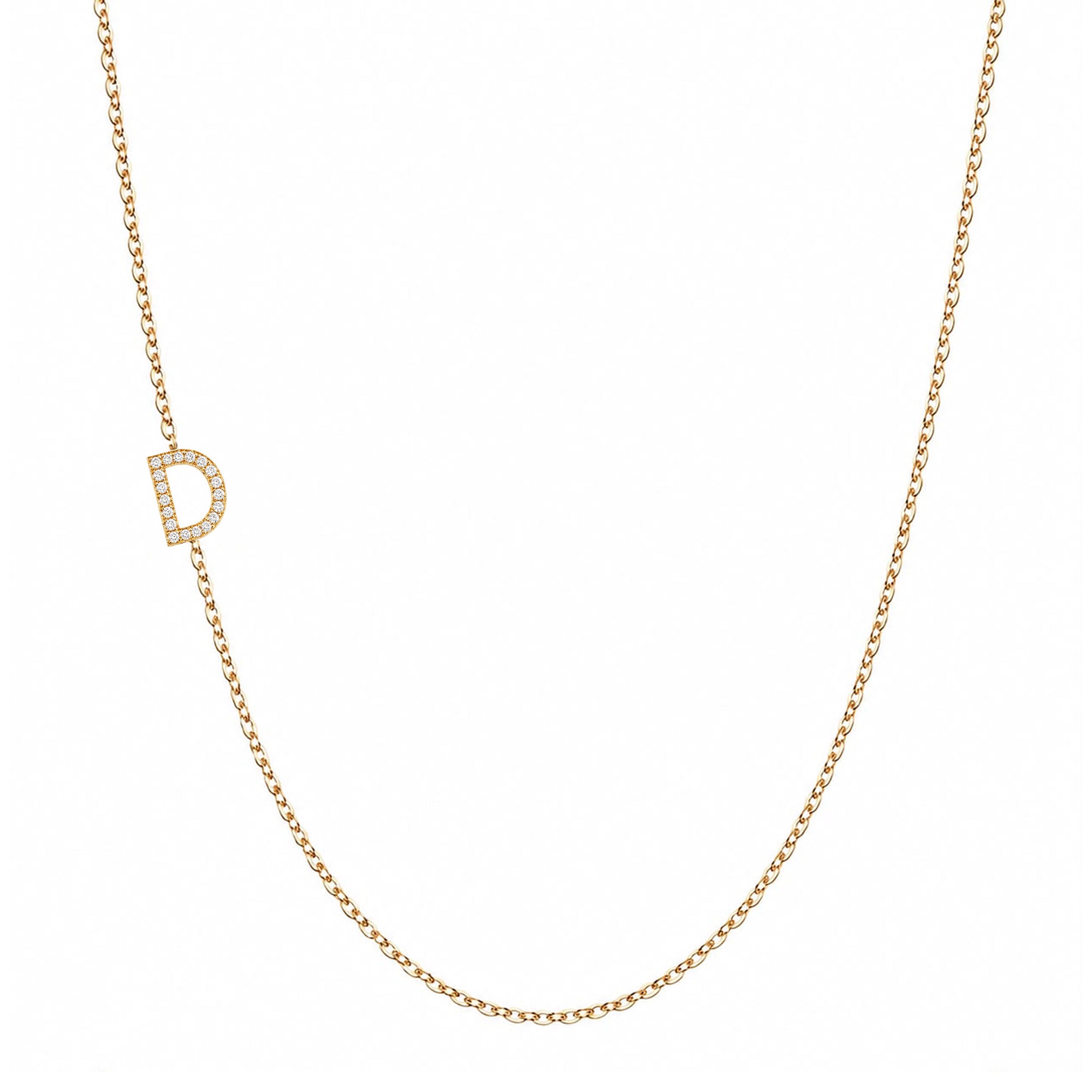 14k gold initial necklace with letter D pave diamond pendant on white background