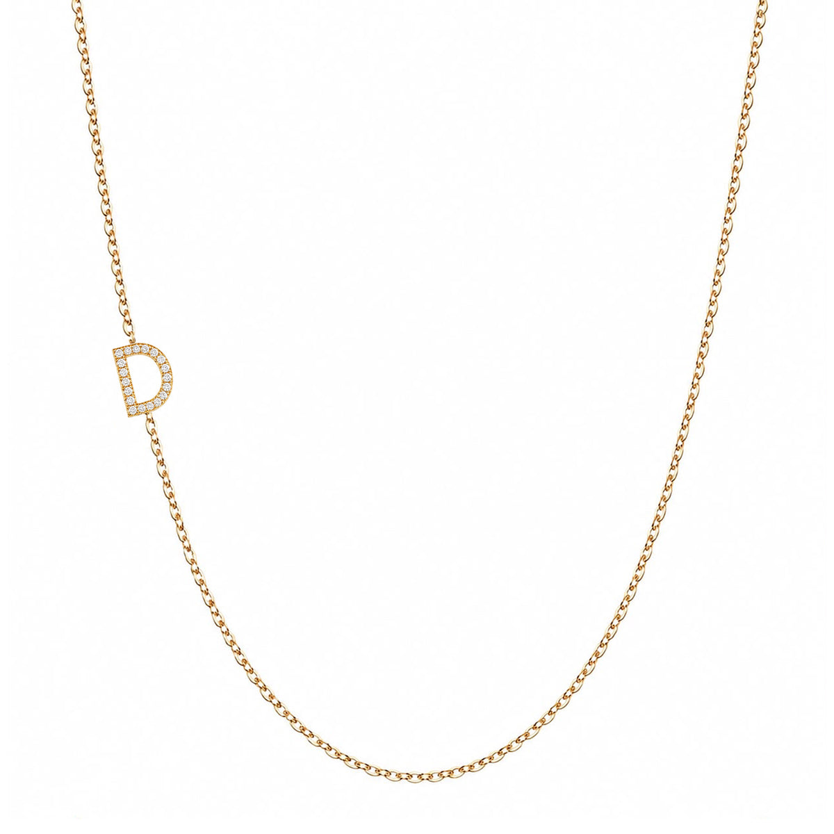 Solid 14K gold pavé diamond Letter D necklace on a white background