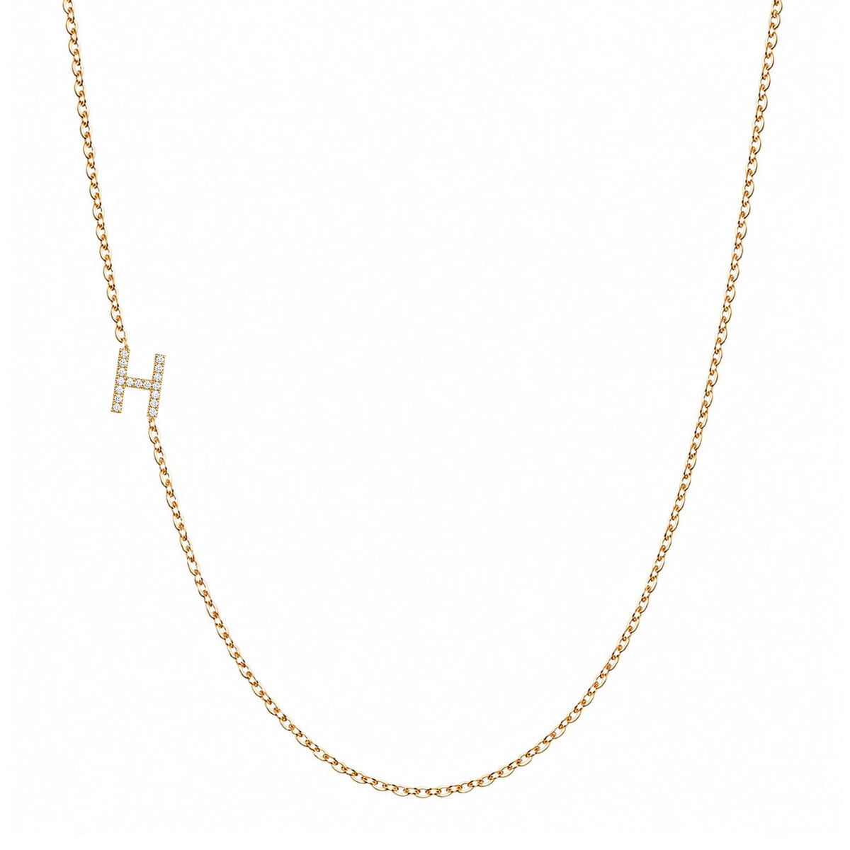 Solid 14K gold pavé diamond Letter H necklace on a white background