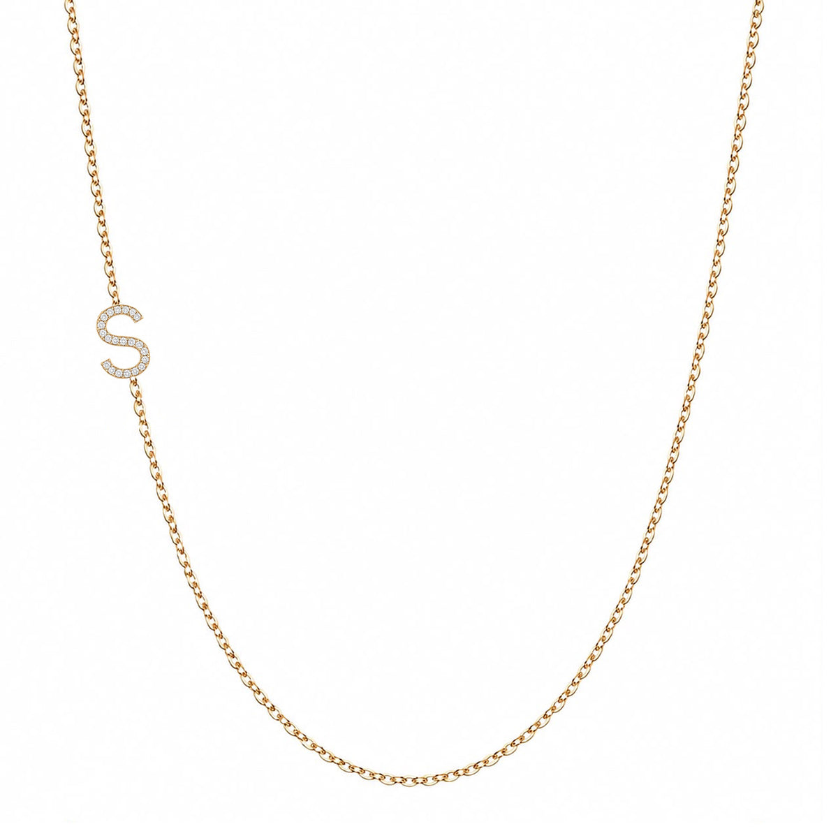 Solid 14K gold pave diamond Letter S necklace on a white background