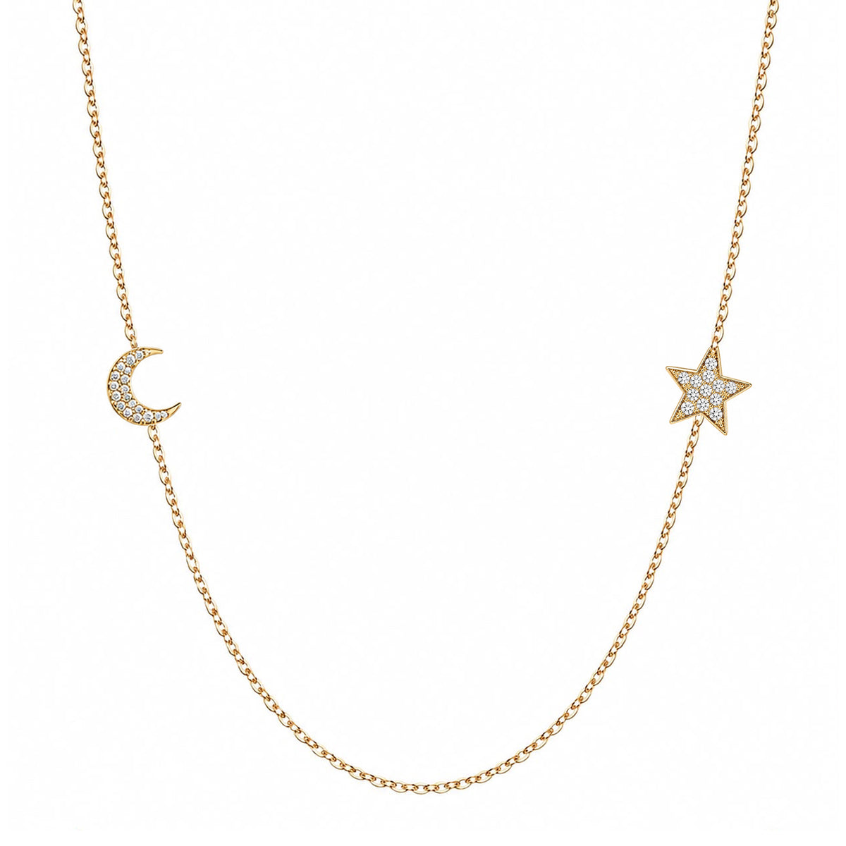 Solid 14K gold pavé diamond moon and star necklace on a white background