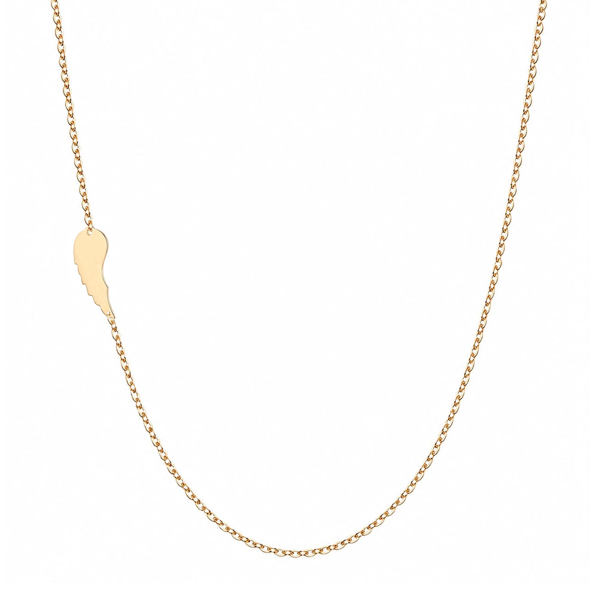 14k gold asymmetrical angel wing necklace on white background