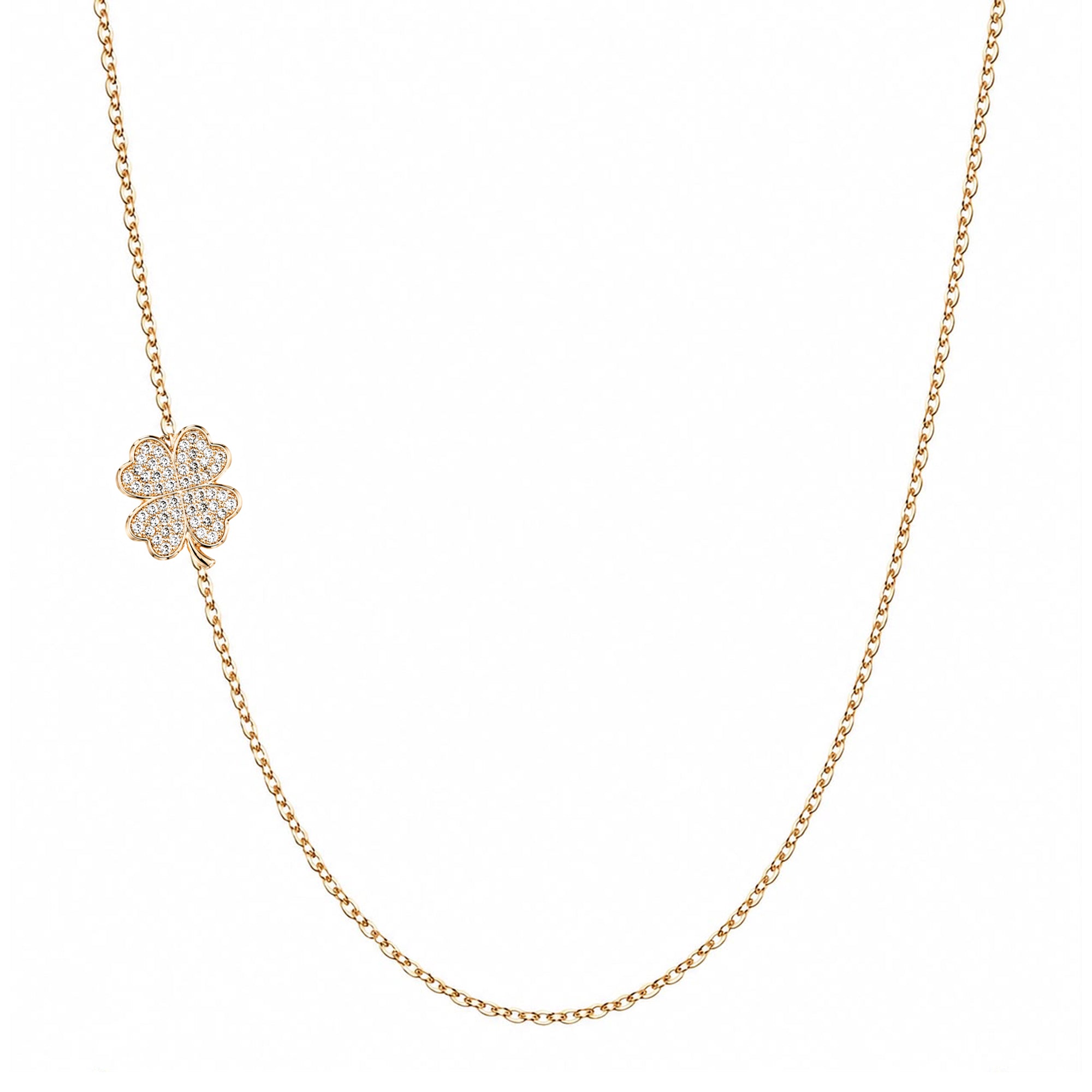 A delicate gold chain necklace featuring a small flower-shaped pendant paved with clear stones, displayed against a solid white background.