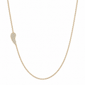 Pave diamond angel wing necklace on woman with asymmetrical charm
