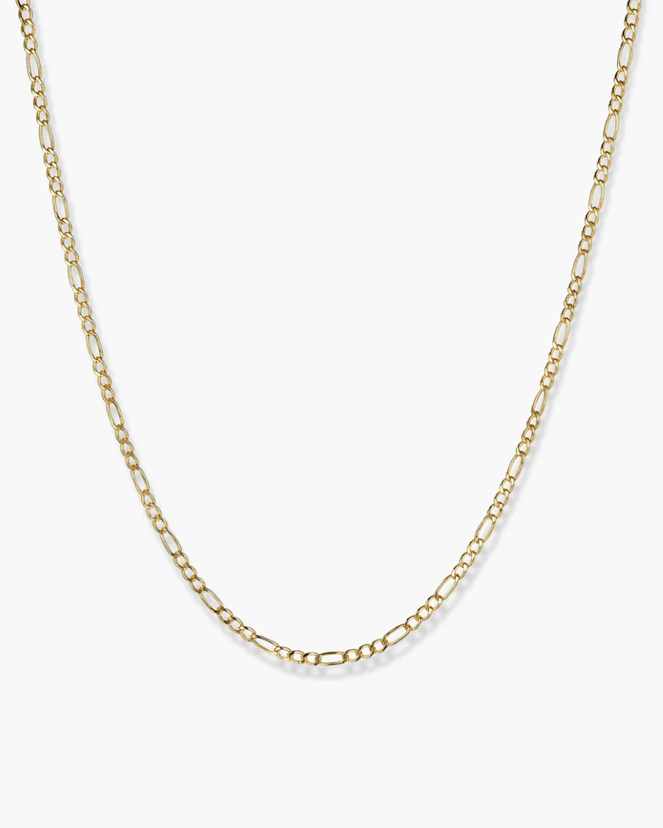 Gold chain necklace on a white background