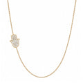 14k gold hamsa pave diamond necklace on white background