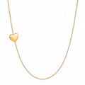 14k gold heart necklace on white background