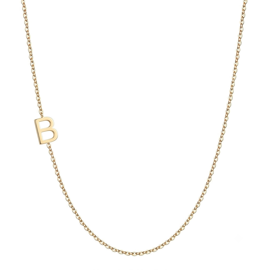 14k gold initial necklace with letter B pendant on white background