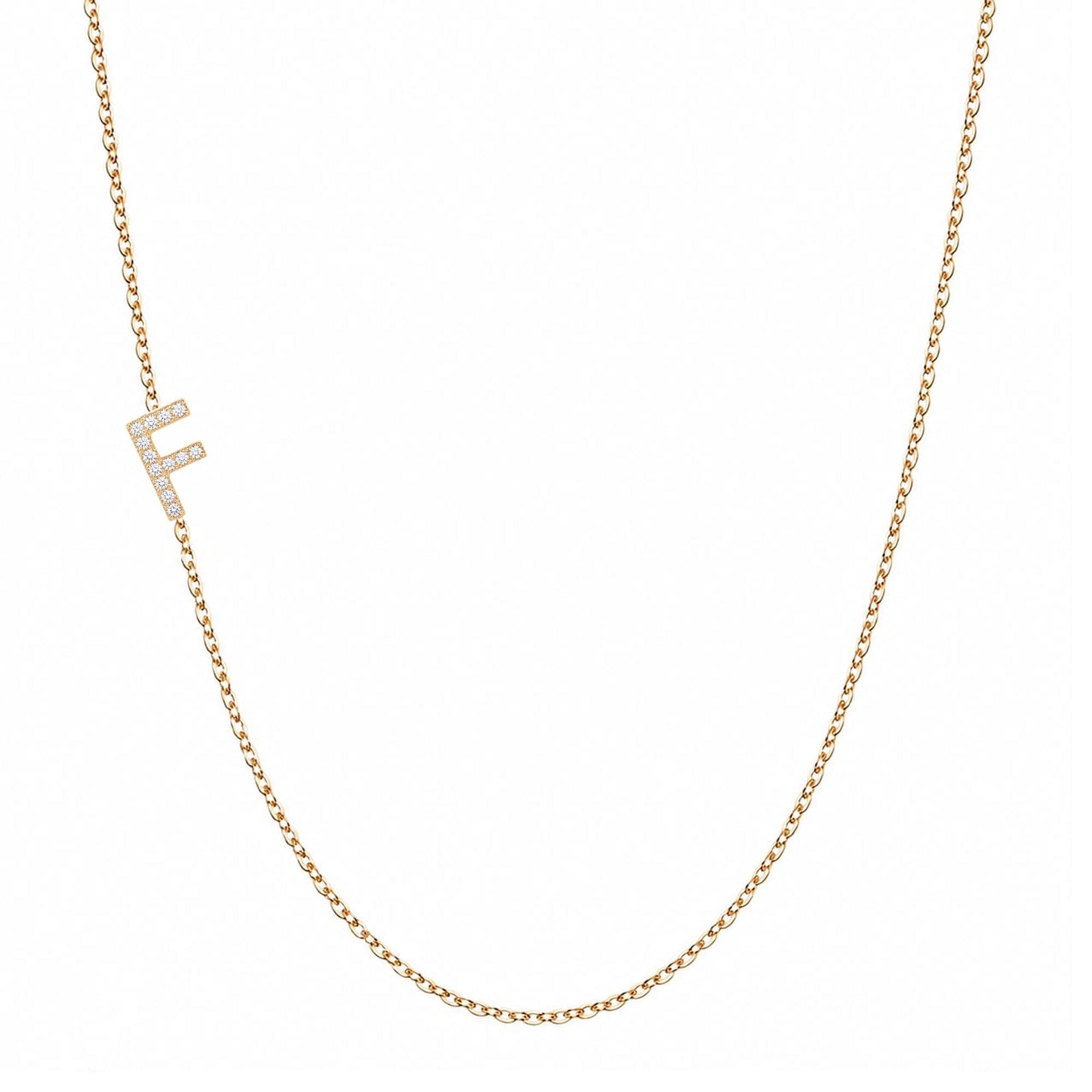 14k gold initial necklace with letter F pave diamond pendant on white background