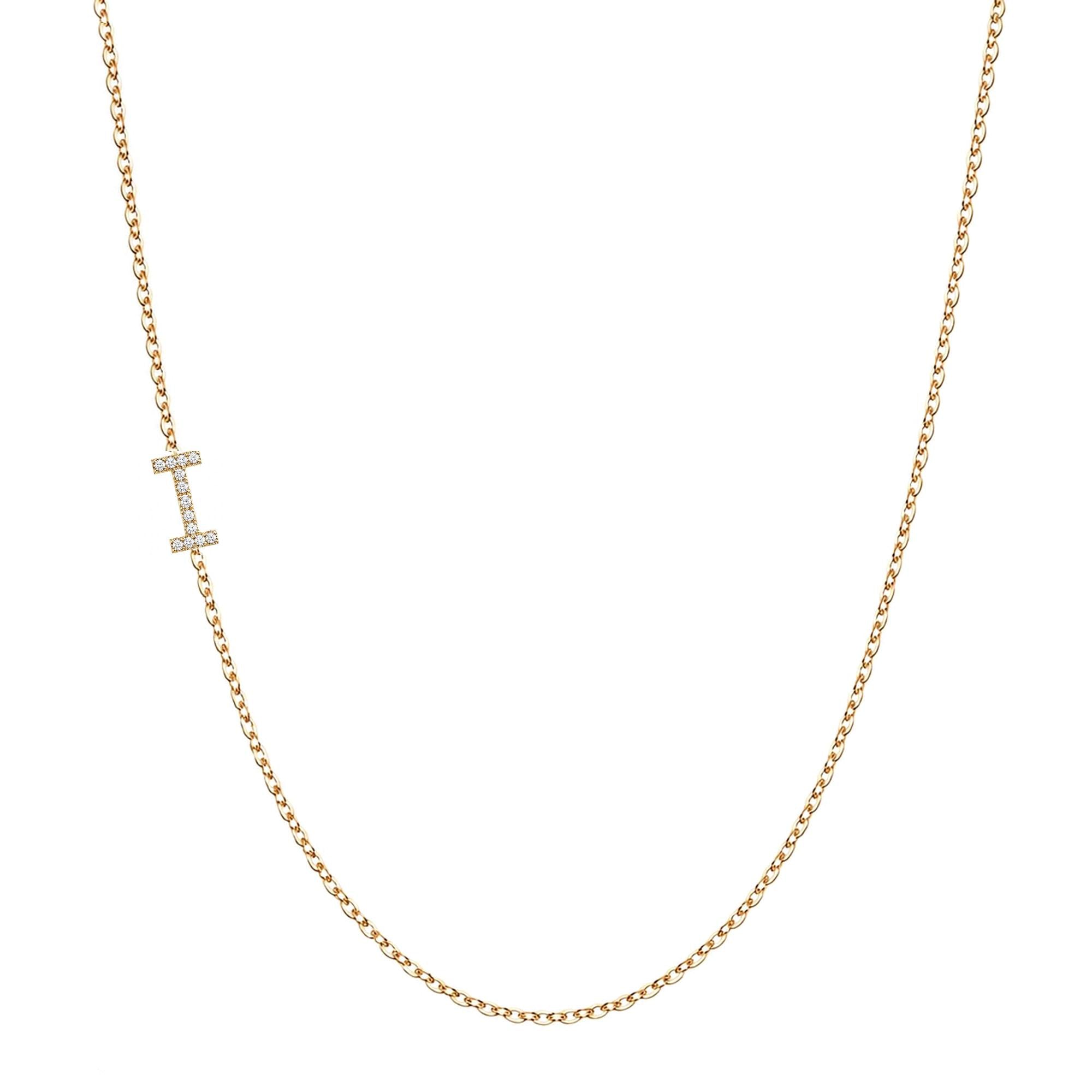 14k gold initial necklace with letter I pave diamond pendant on white background