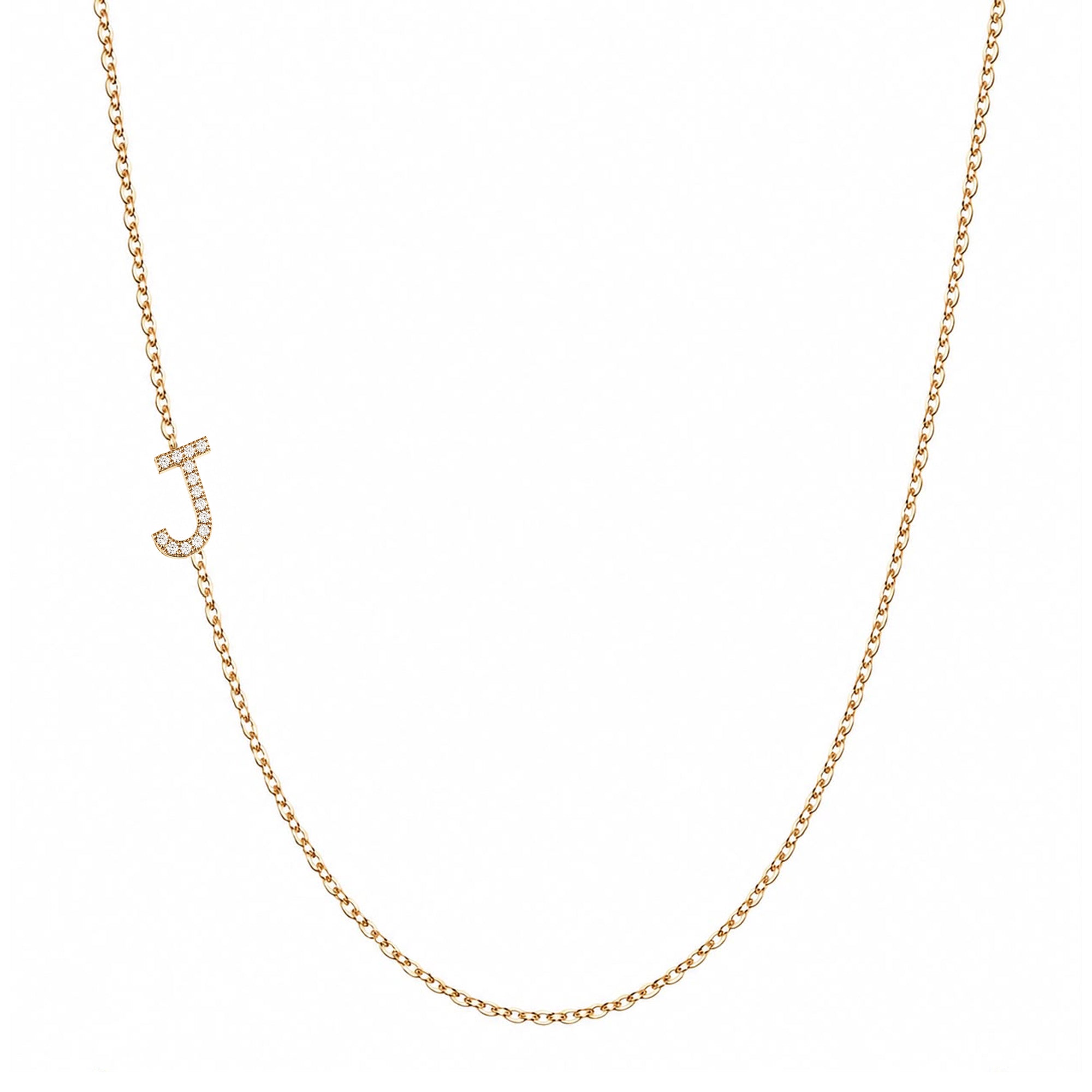 14k gold initial necklace with letter J pave diamond pendant on white background