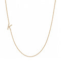 14k gold initial necklace with letter K pave diamond pendant on white background