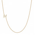 14k gold initial necklace with letter M pave diamond pendant on white background