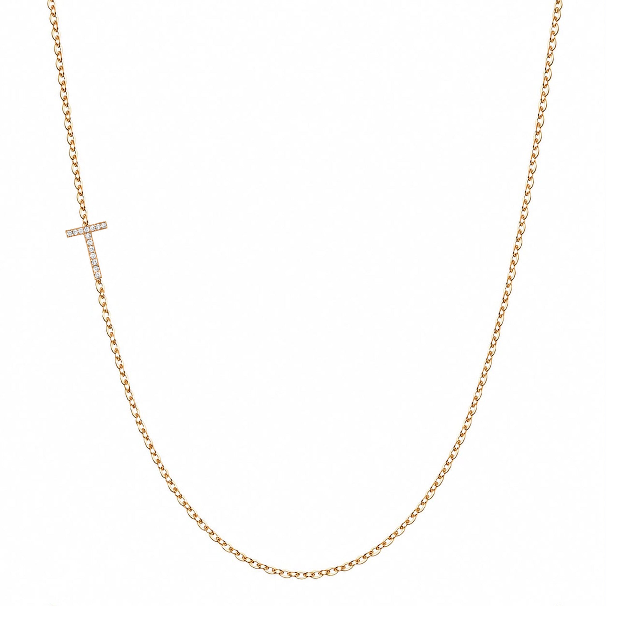 14k gold initial necklace with letter T pave diamond pendant on white background