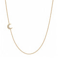 14k gold moon pave diamond necklace on white background