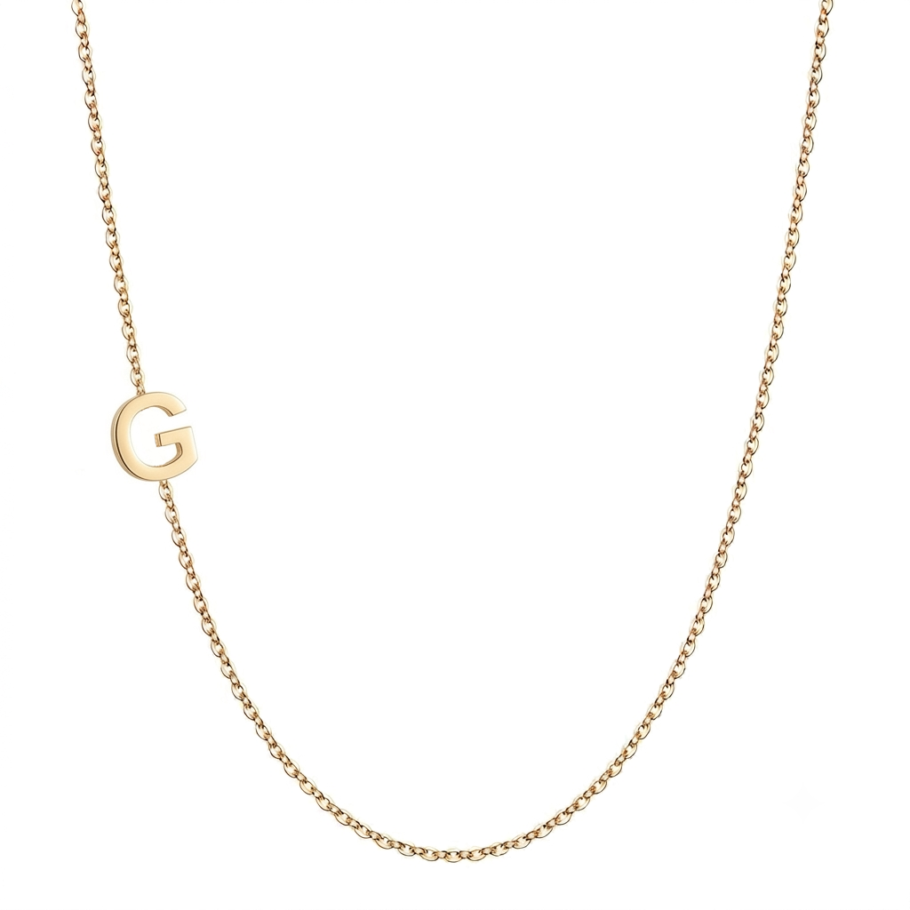 14k gold sideways initial necklace with letter G pendant on white background