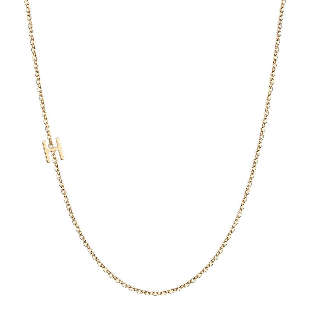 14k gold sideways initial necklace with letter H pendant on white background