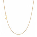 14k gold sideways initial necklace with letter J pendant on white background