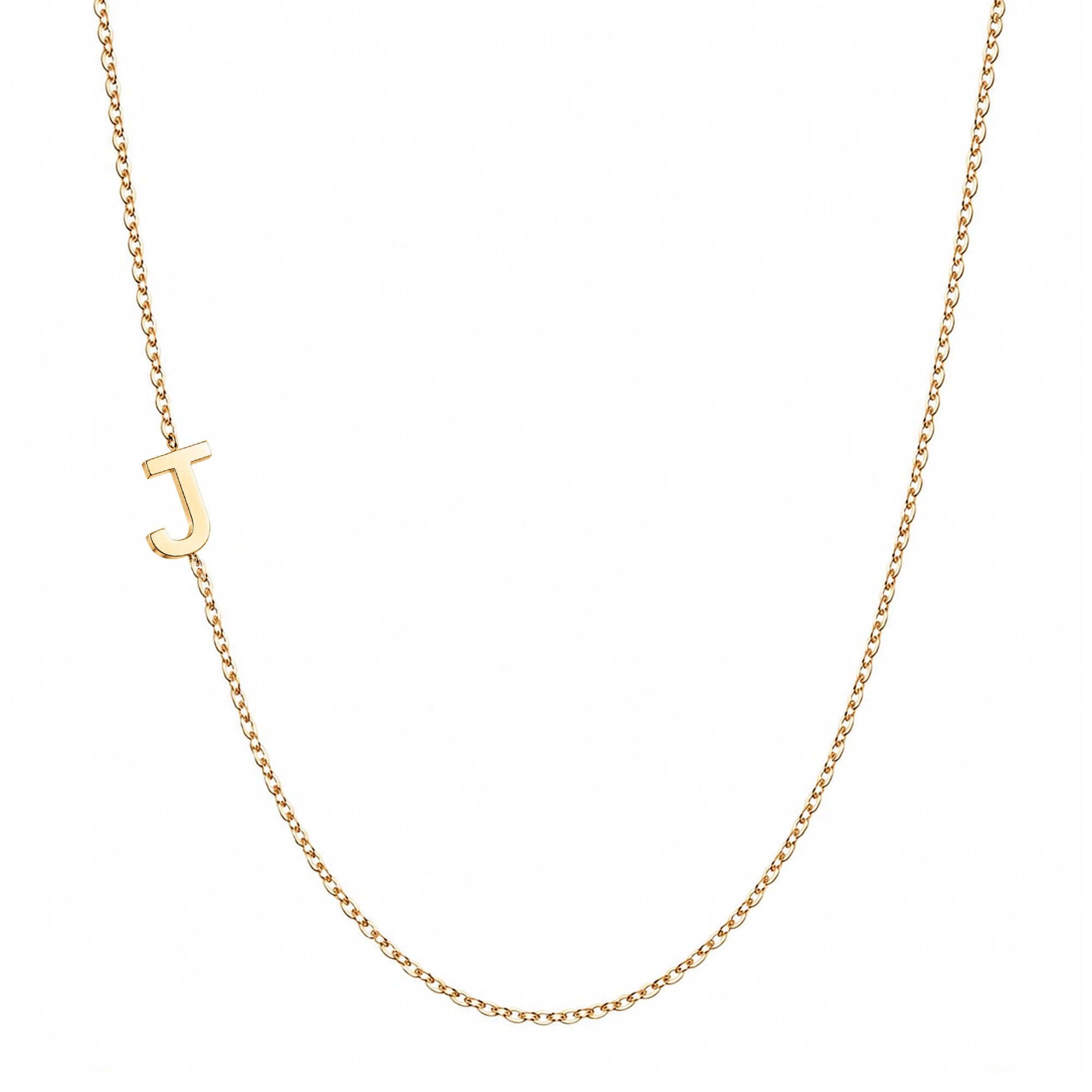 14k gold sideways initial necklace with letter J pendant on white background