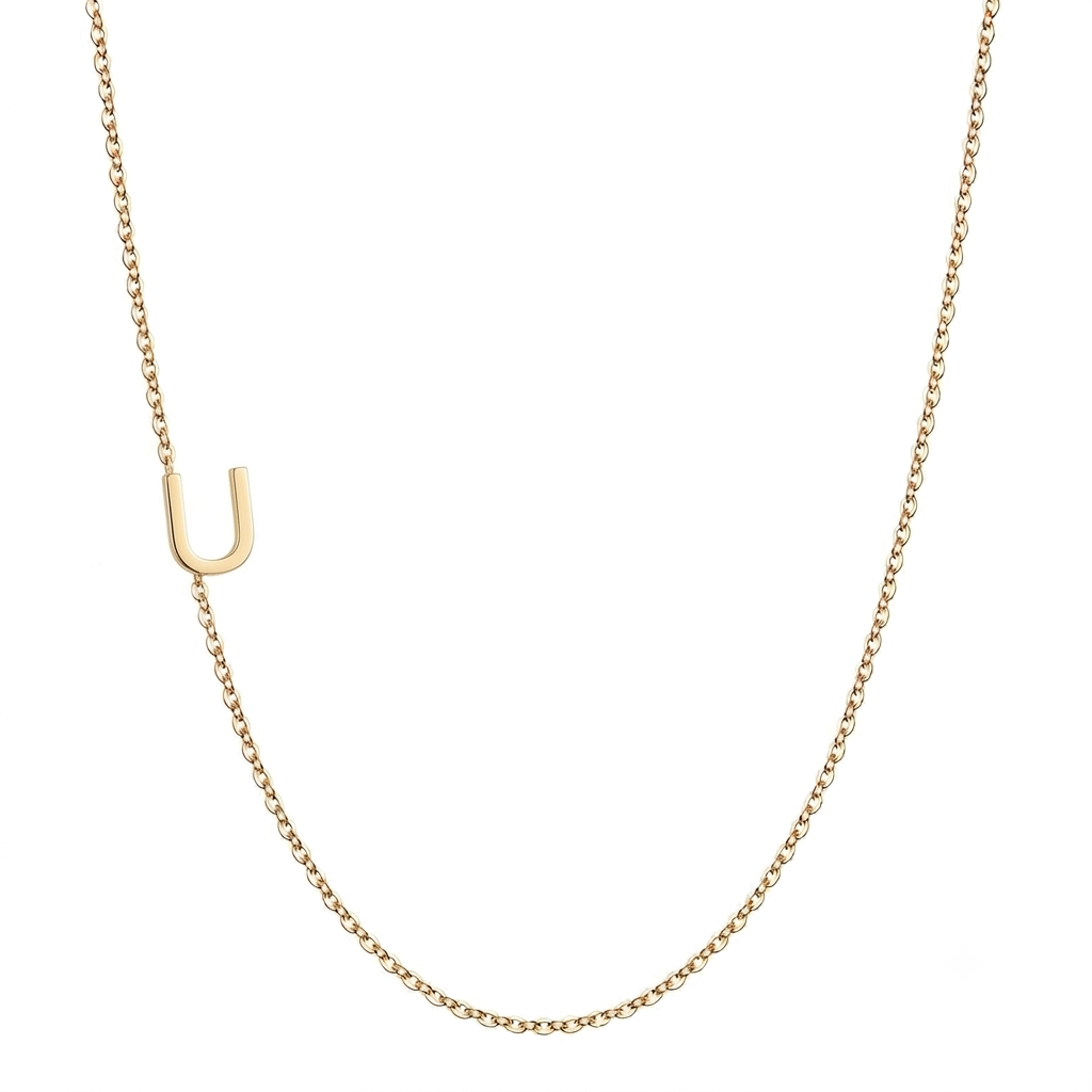 14k gold sideways initial necklace with letter U pendant on white background