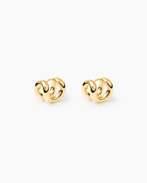 yellow gold earring with on a white background